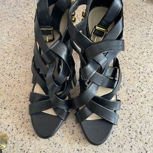 Black heels with gold studs